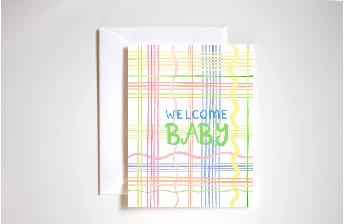 Colorful plaid card with 'Welcome Baby' text on a white background