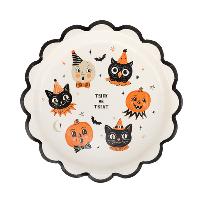 Halloween-themed paper plate with vintage cartoon characters on a white background