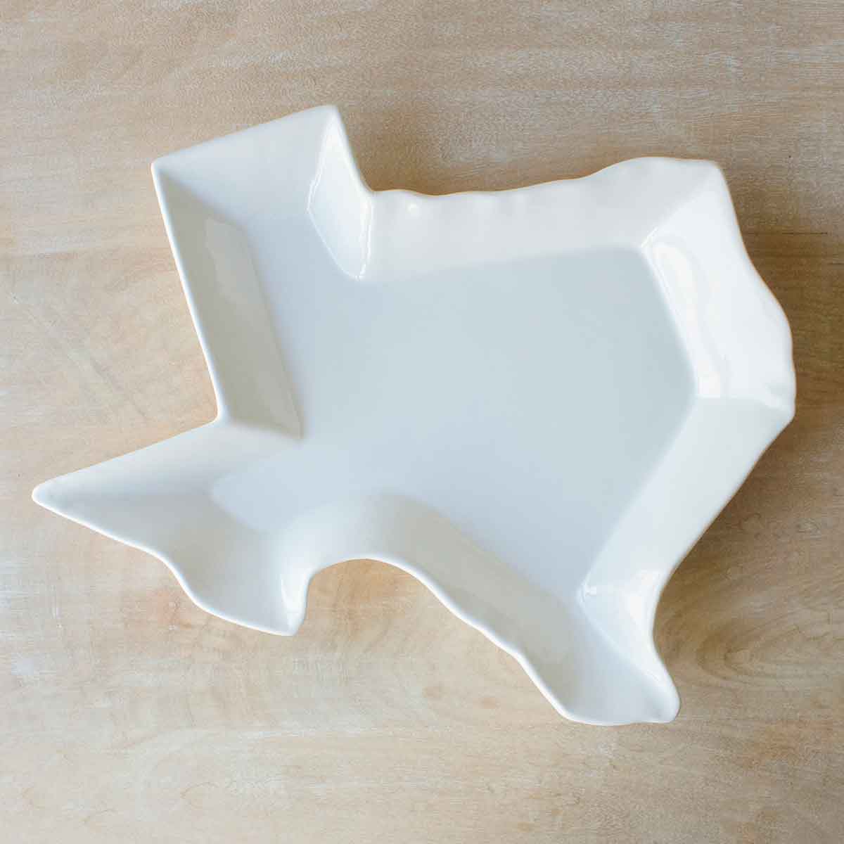 White ceramic Texas-shaped bowl platter