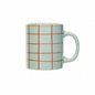 A ceramic mug with a light blue speckled glaze and a grid pattern of orange lines, featuring a matching light blue handle and rim.